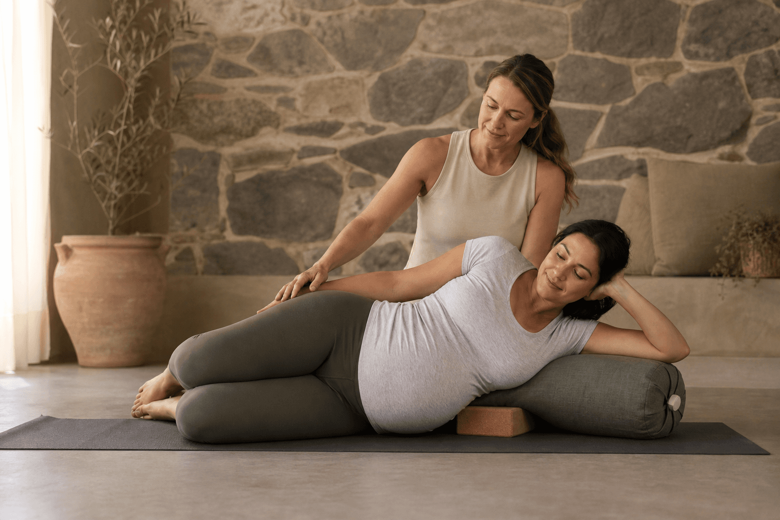 Supportive modification for a prenatal student on a mat